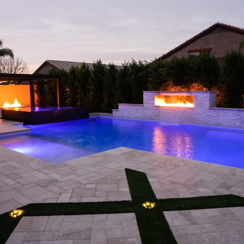 Custom pool and backyard on Macaw Court in Gilbert, AZ by Envy Pools