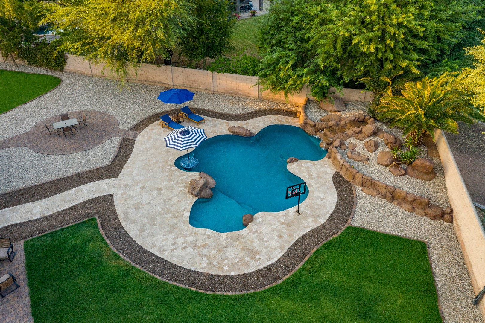 Aerial view of custom freeform pool and backyard on Lobo Avenue in Mesa, AZ by Envy Pools