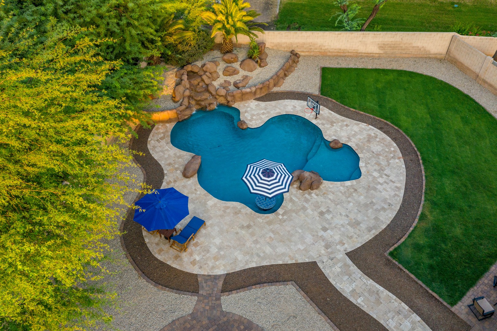 Aerial view of custom freeform pool and backyard on Lobo Avenue in Mesa, AZ by Envy Pools