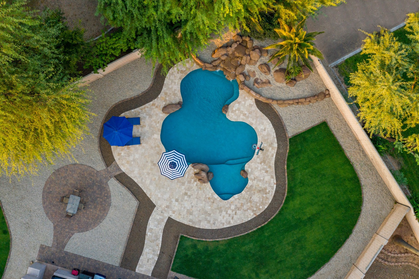 Aerial view of custom freeform pool and backyard on Lobo Avenue in Mesa, AZ by Envy Pools