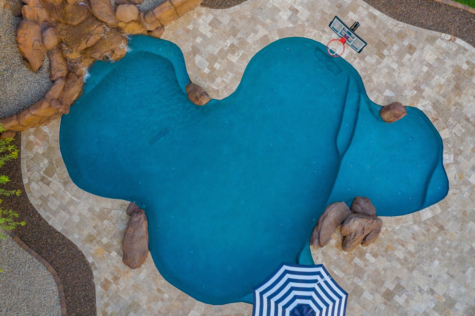Aerial view of custom freeform pool and backyard on Lobo Avenue in Mesa, AZ by Envy Pools