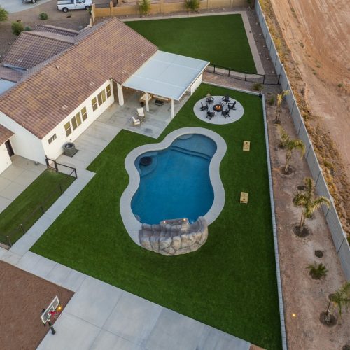 Aerial view of custom pool and backyard on Paoli Street in Queen Creek, AZ by Envy Pools