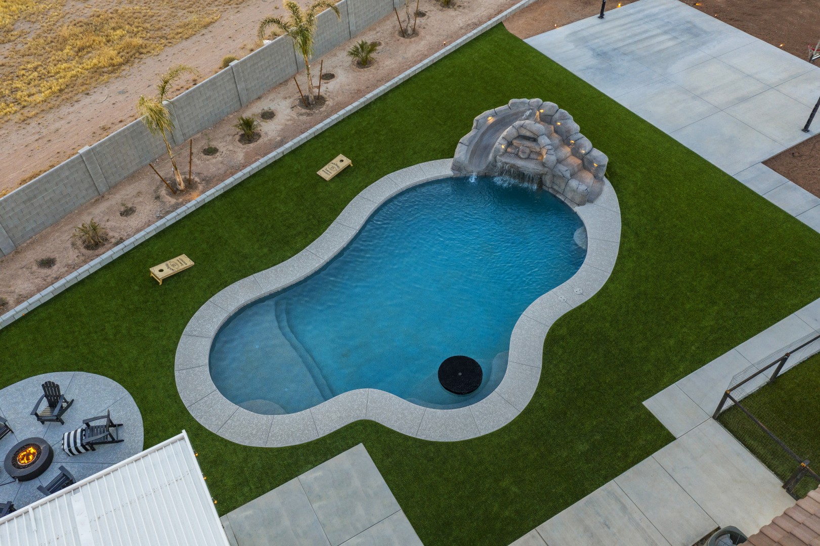 Aerial view of custom pool and backyard on Paoli Street in Queen Creek, AZ by Envy Pools