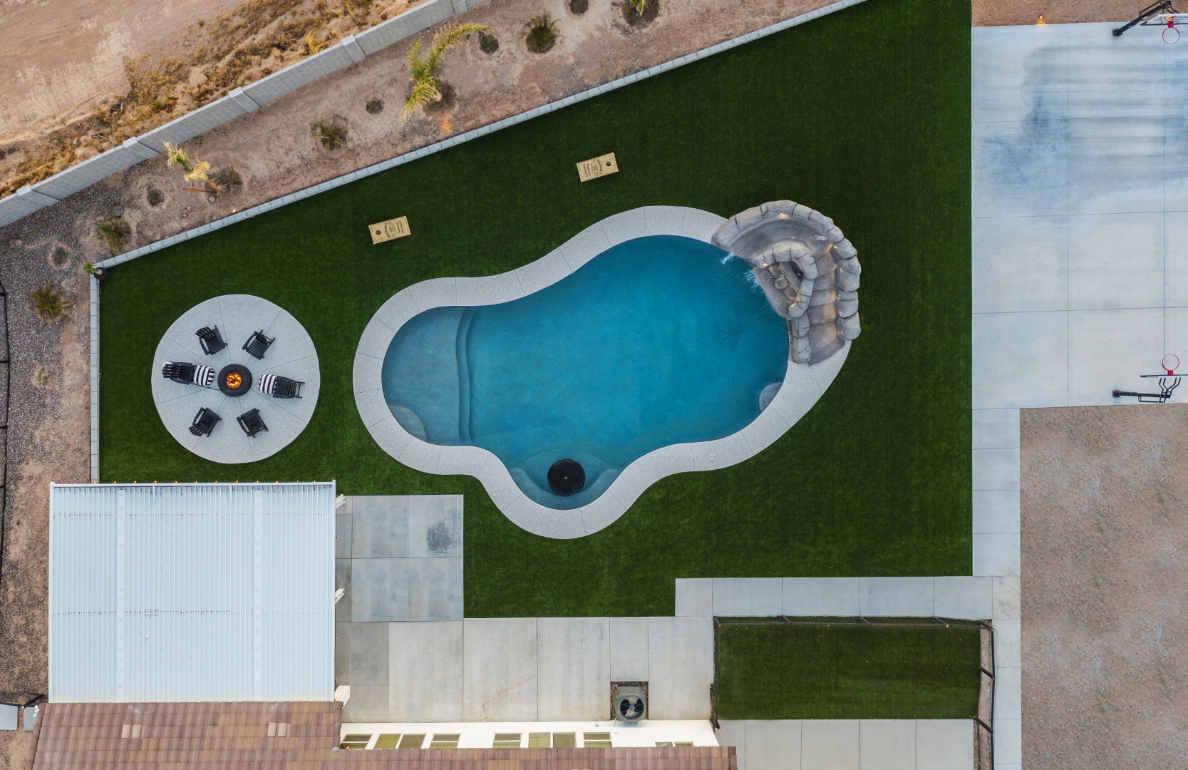 Aerial view of custom pool and backyard on Paoli Street in Queen Creek, AZ by Envy Pools