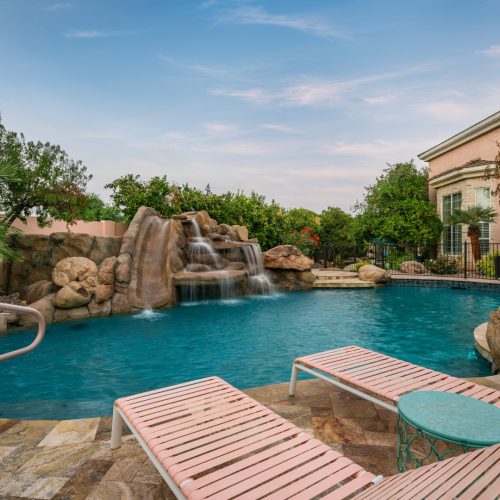 Pool and grotto at dusk