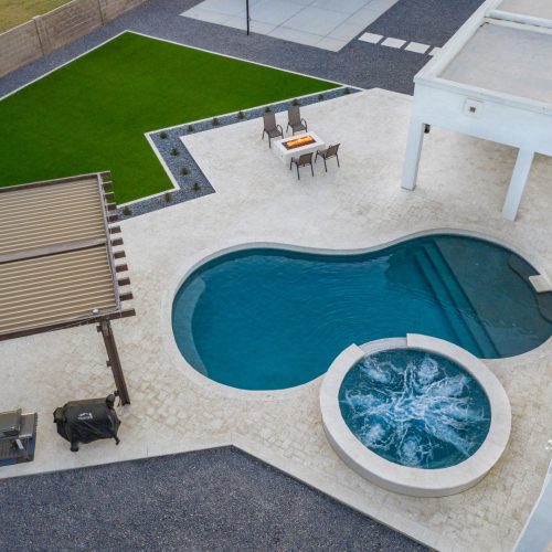 Aerial pool spa and louvered pergola at a Gilbert, AZ home