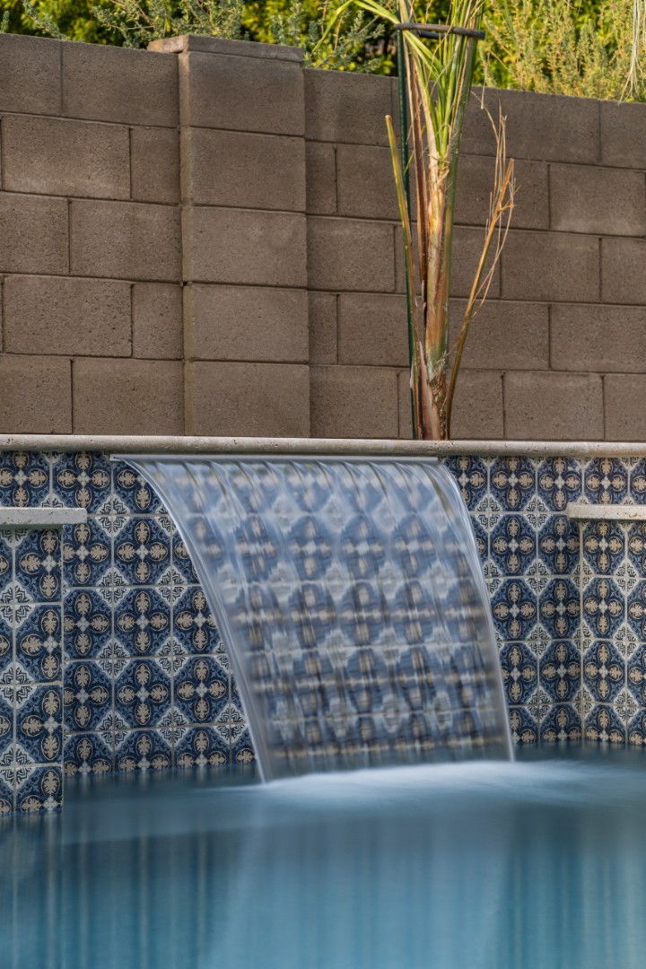 Custom pool and waterfall design on Marlene Drive in Gilbert, AZ by Envy Pools