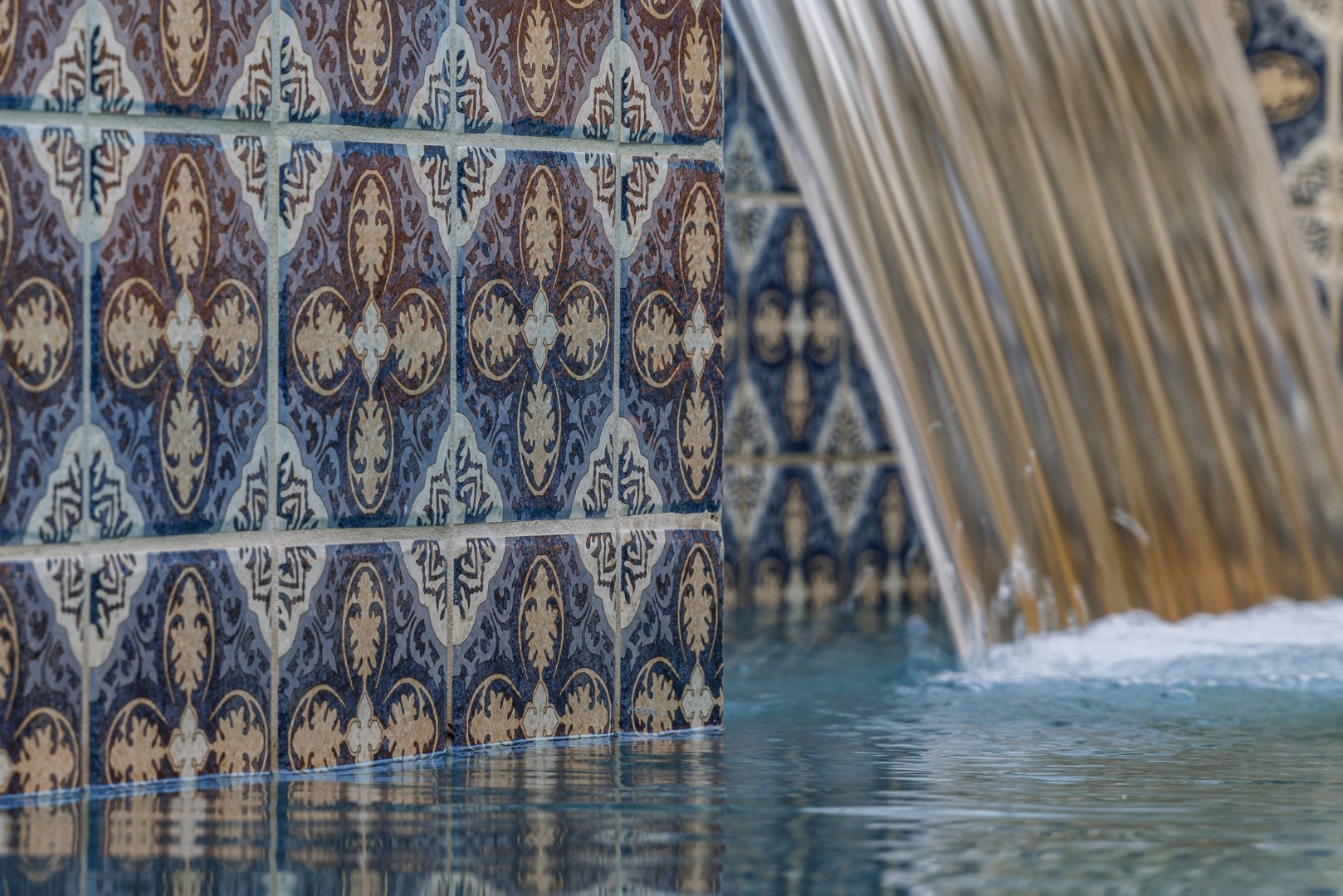 Custom pool and waterfall design on Marlene Drive in Gilbert, AZ by Envy Pools