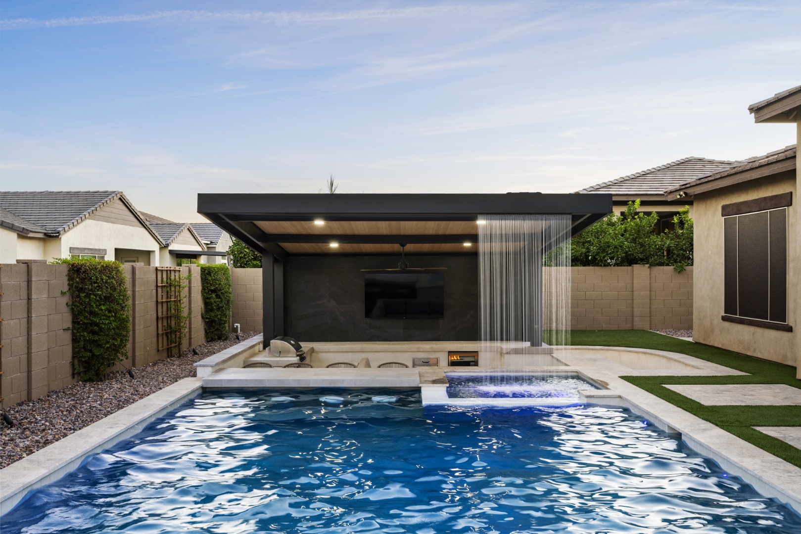Custom pool, spa and outdoor kitchen on Mead Drive in Gilbert, AZ by Envy Pools