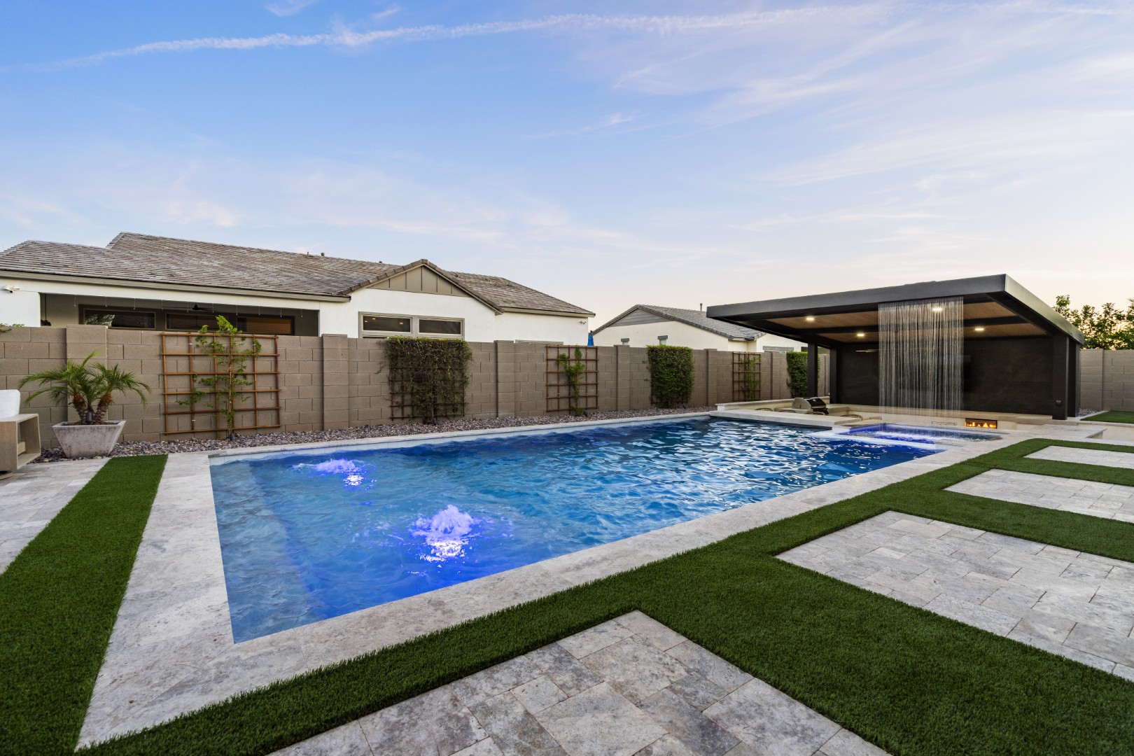 Custom pool, spa and outdoor kitchen on Mead Drive in Gilbert, AZ by Envy Pools