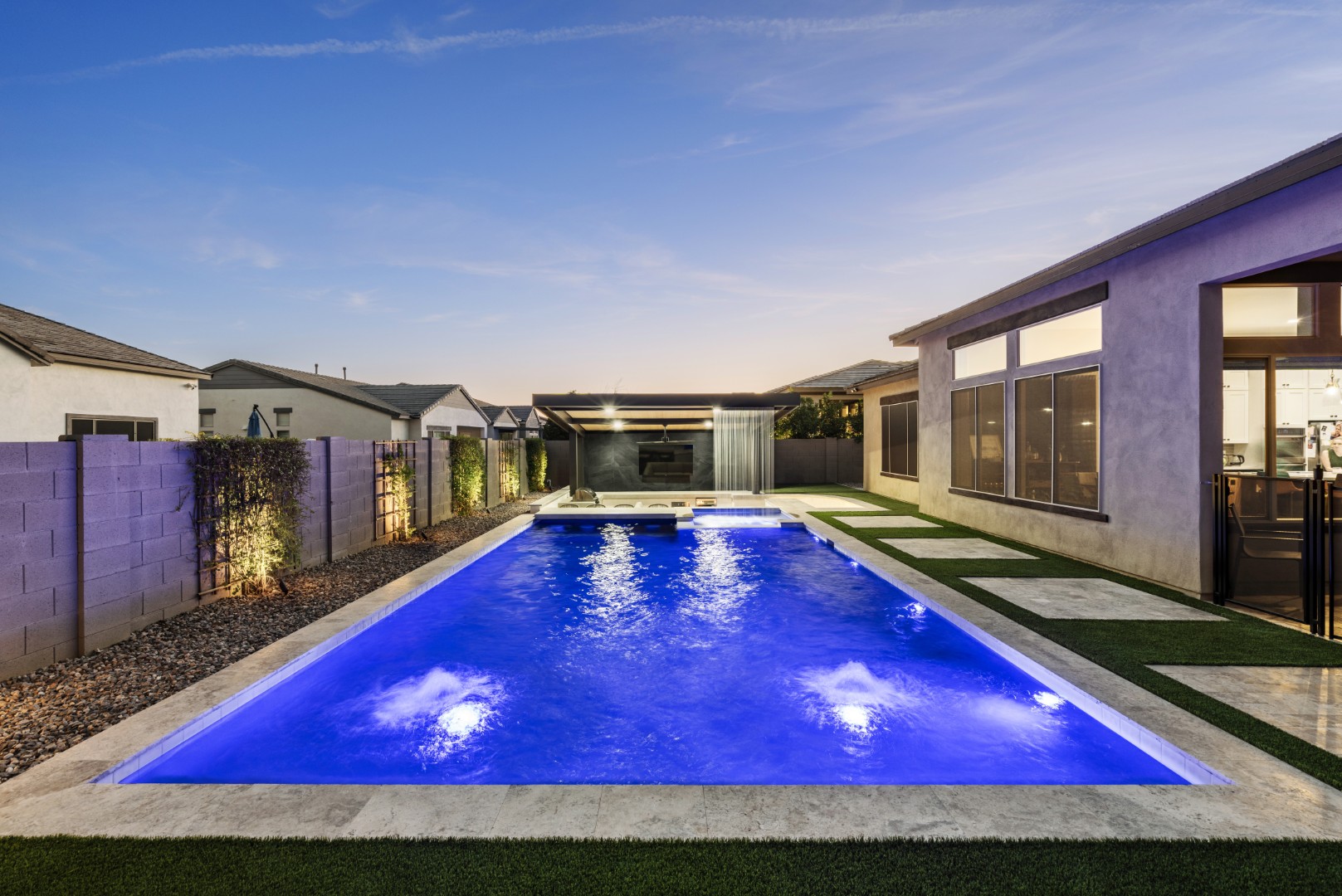 Custom pool, spa and outdoor kitchen on Mead Drive in Gilbert, AZ by Envy Pools