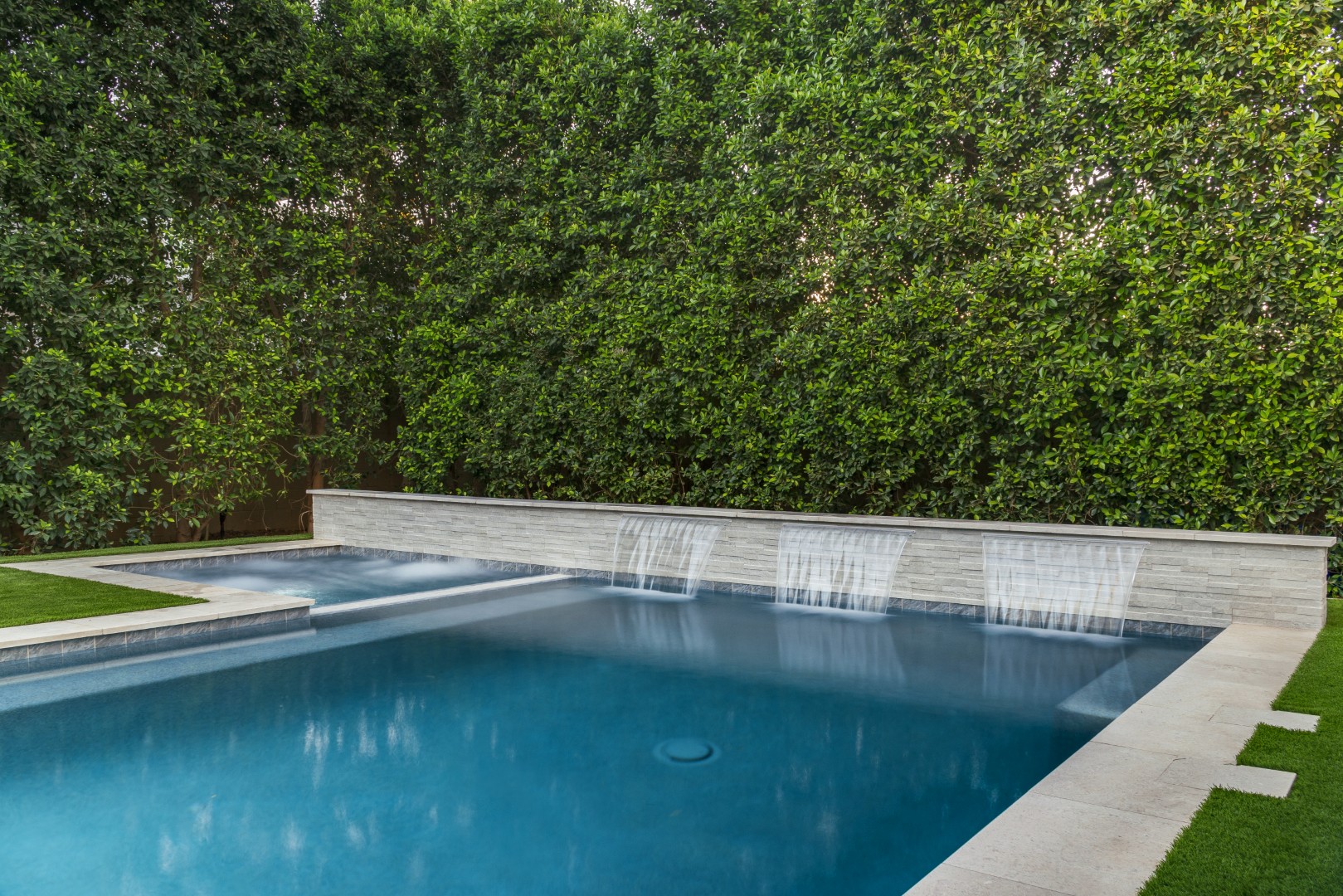 Custom pool and backyard design on Amber Lane in Gilbert, AZ by Envy Pools