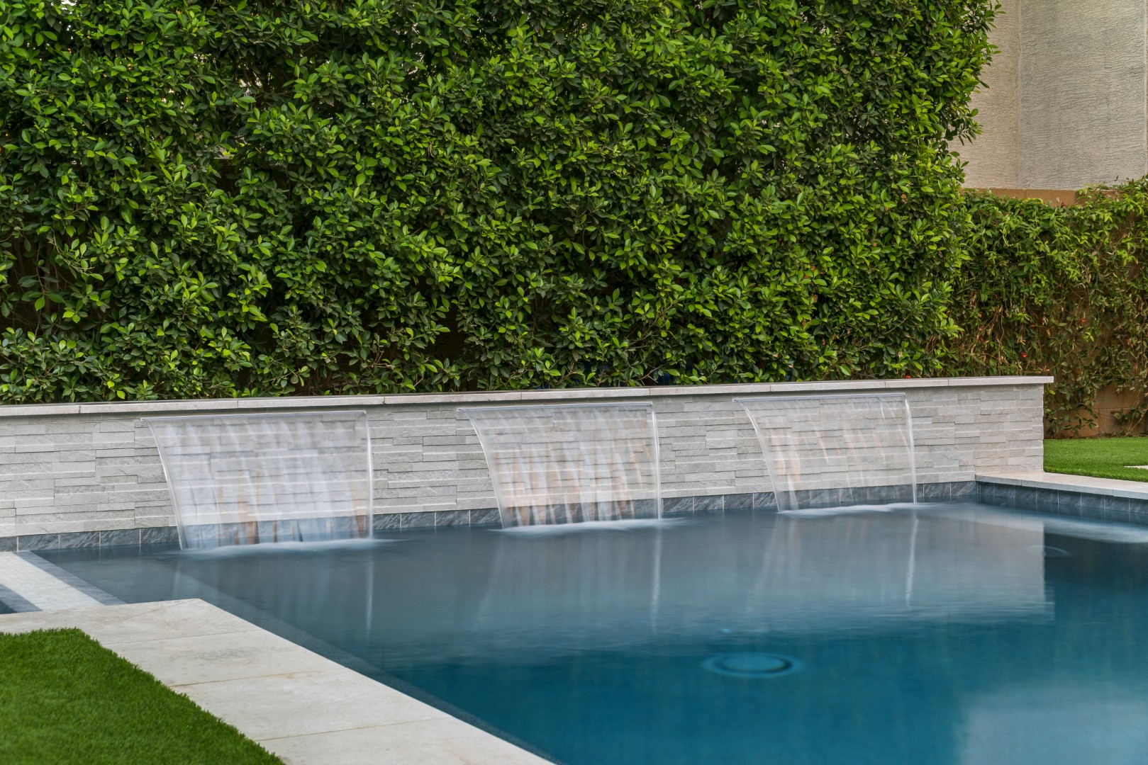 Custom pool and backyard design on Amber Lane in Gilbert, AZ by Envy Pools