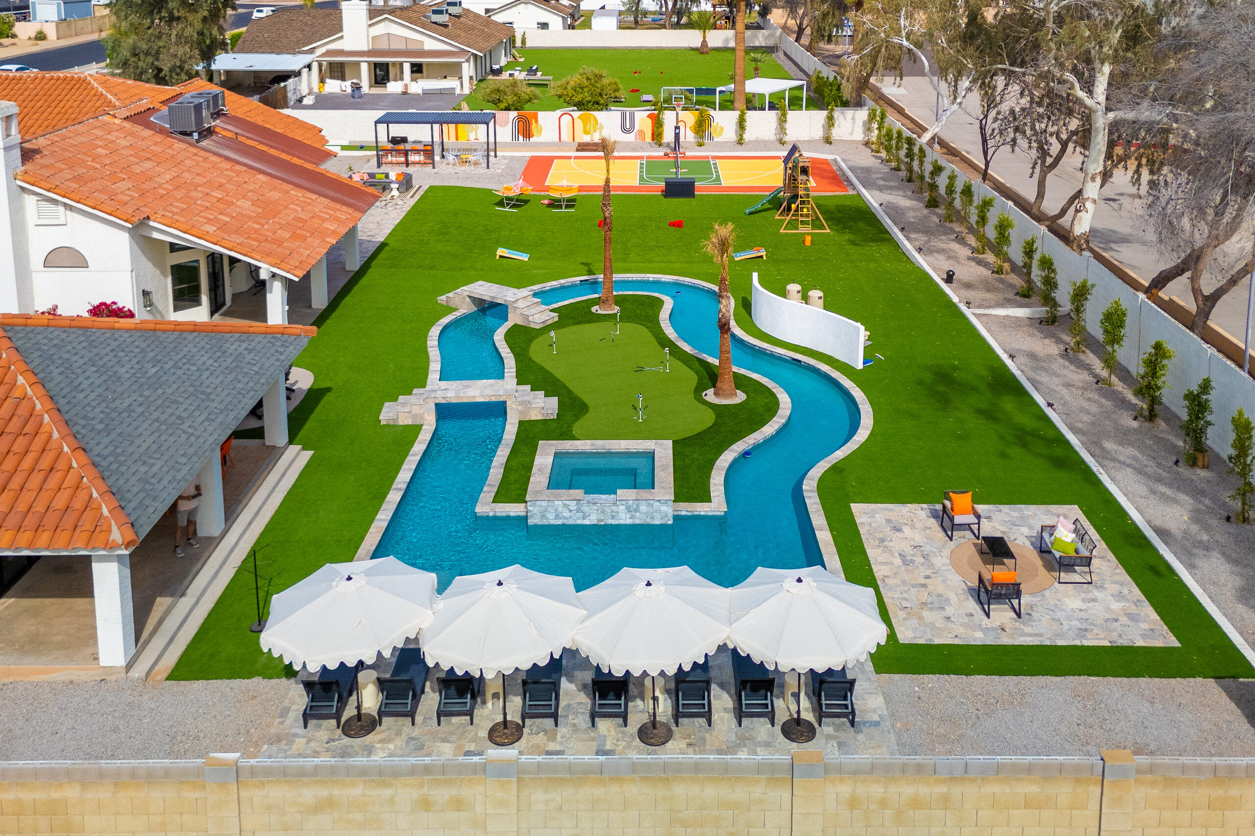 Aerial of the lazy river, sport court and pool in Glendale, AZ