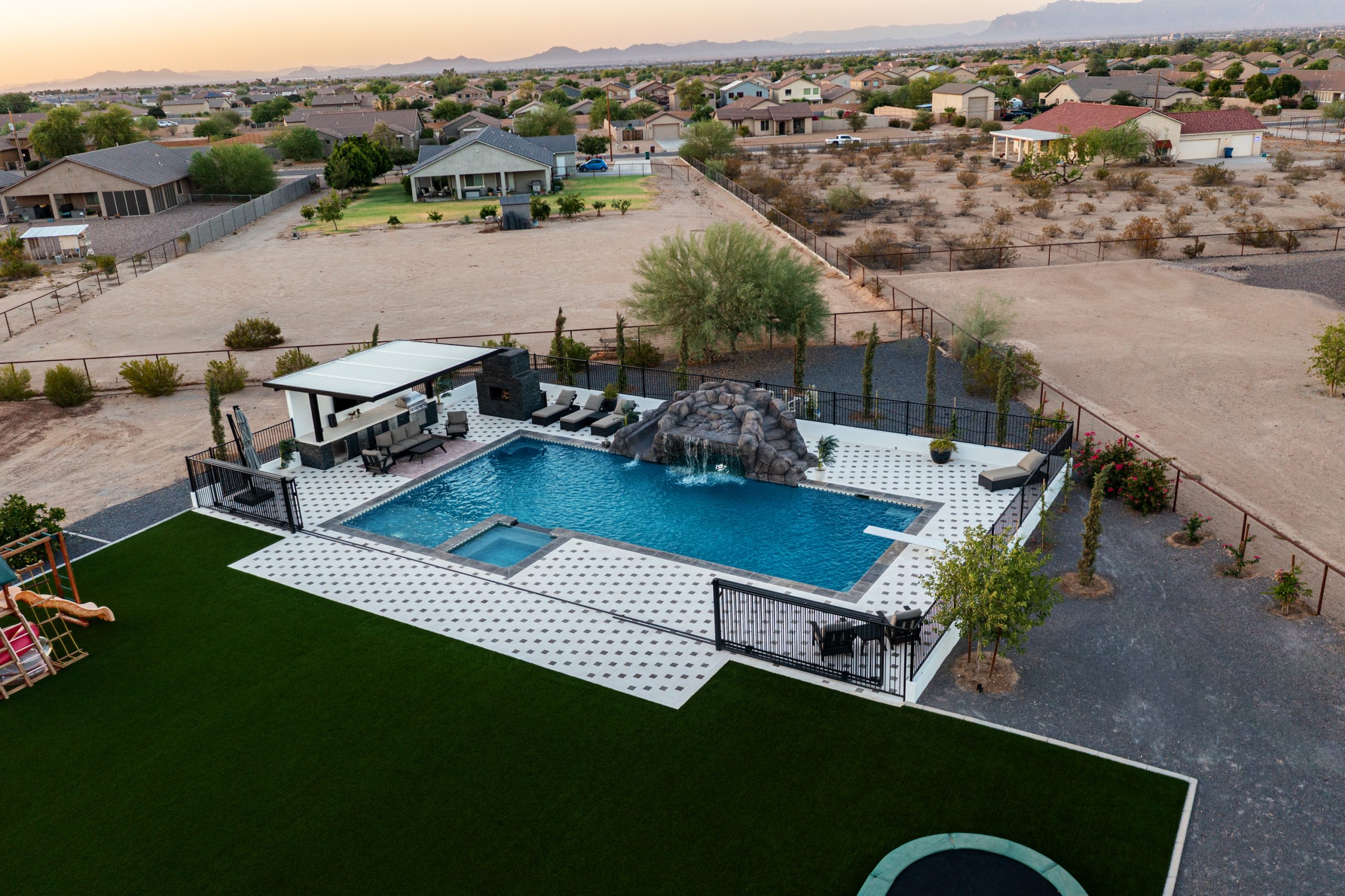 Aerial view of a large custom pool and backyard resort in San Tan Valley, AZ