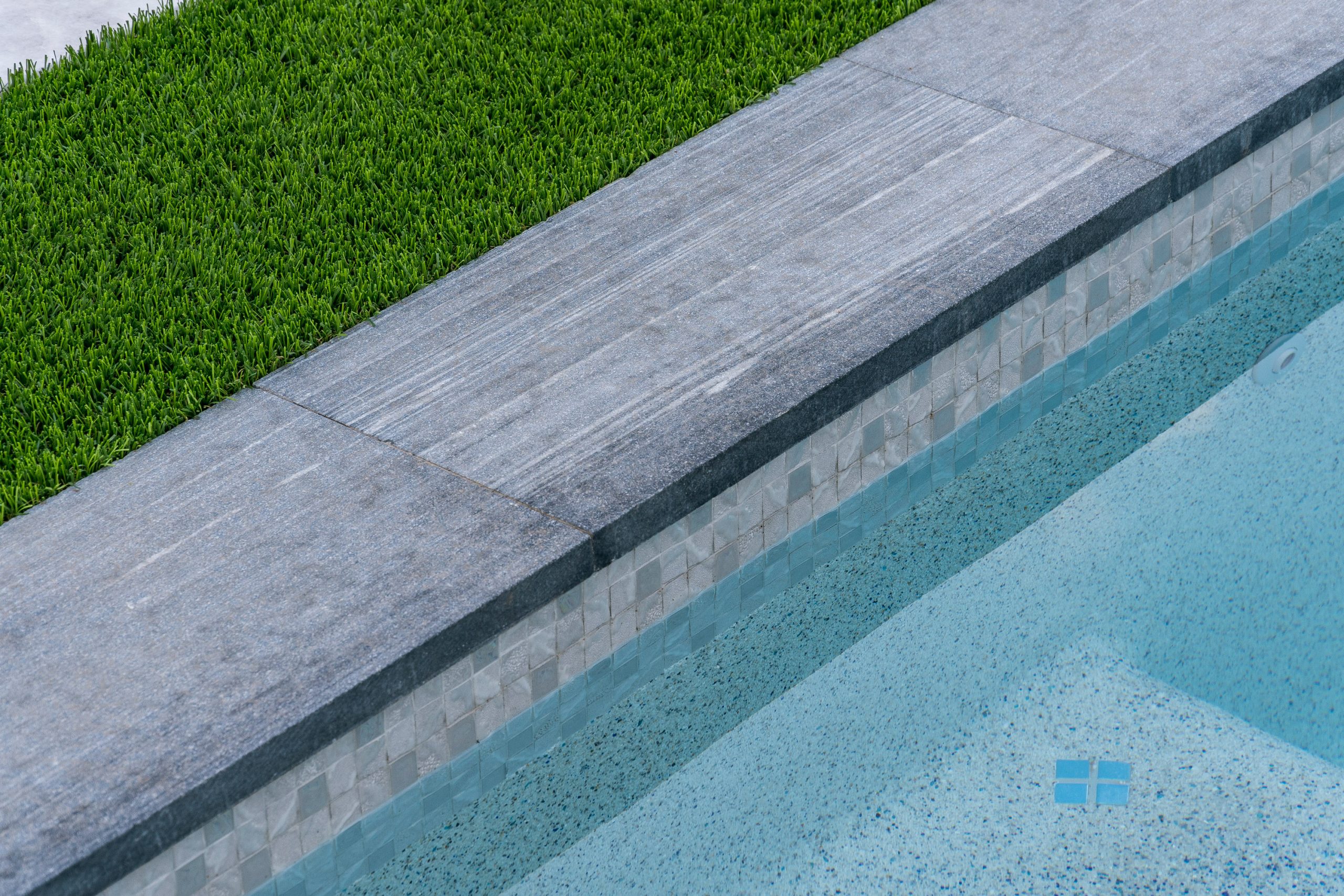 Waterline tile and coping edge on a modern pool in Scottsdale, AZ